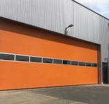 PORTES DE GARAGE SECTIONNELLES A REFOULEMENT PLAFOND INDUSTRIELLES
