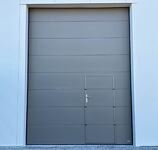 PORTES DE GARAGE SECTIONNELLES A REFOULEMENT PLAFOND INDUSTRIELLES