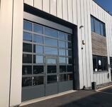 PORTES DE GARAGE SECTIONNELLES A REFOULEMENT PLAFOND INDUSTRIELLES