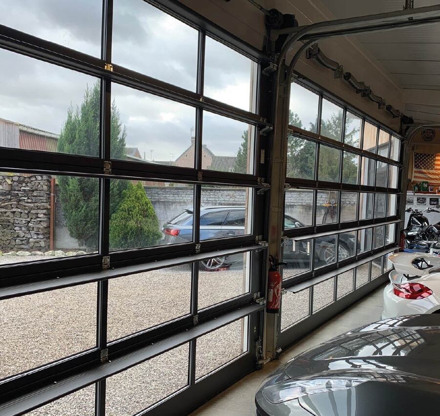 PORTES DE GARAGE SECTIONNELLES A REFOULEMENT PLAFOND INDUSTRIELLES