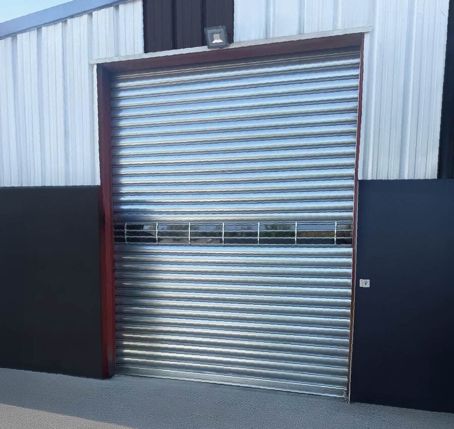 PORTES DE GARAGE SECTIONNELLES A REFOULEMENT PLAFOND INDUSTRIELLES